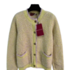 Yellow cardigan with a textured knit pattern